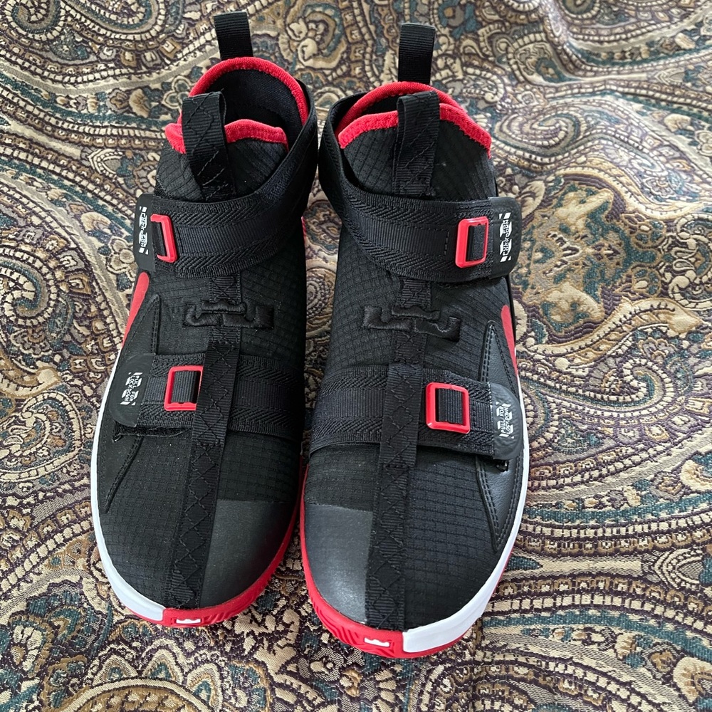 Brand new Big kids Lebron shoes by Nike. Black, red and white.